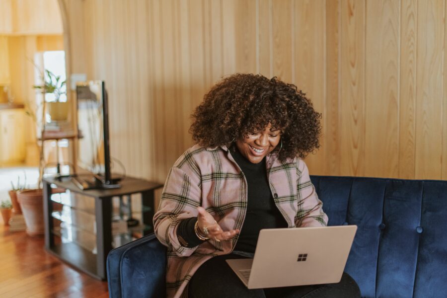 A woman with a laptop.