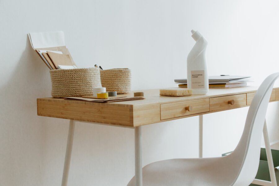 Cleaning products on a wooden table.